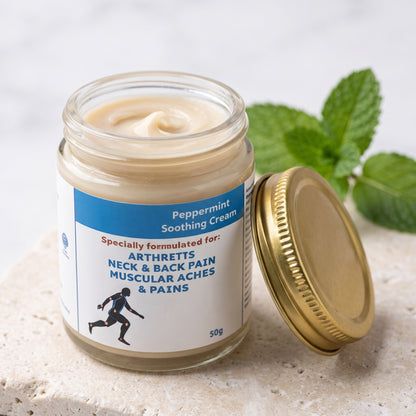 Peppermint Soothing Cream open jar showing the cream texture, gold lid beside it